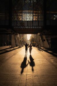 Shadows of two people walking to their cbt therapy port jefferson, new york session