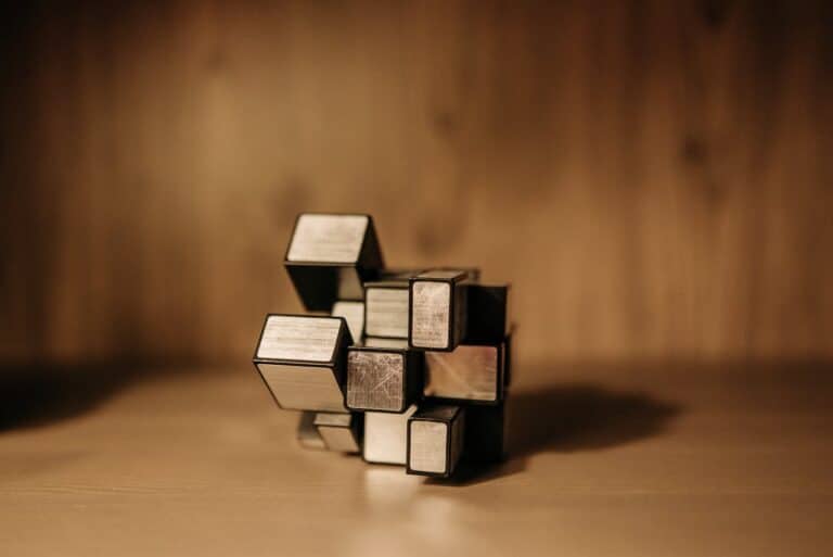 abstract cube puzzle representing thought patterns and cognitive restructuring in CBT for complex trauma
